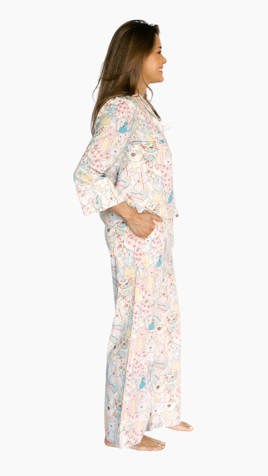 Woman wearing a floral nightgown on a white background