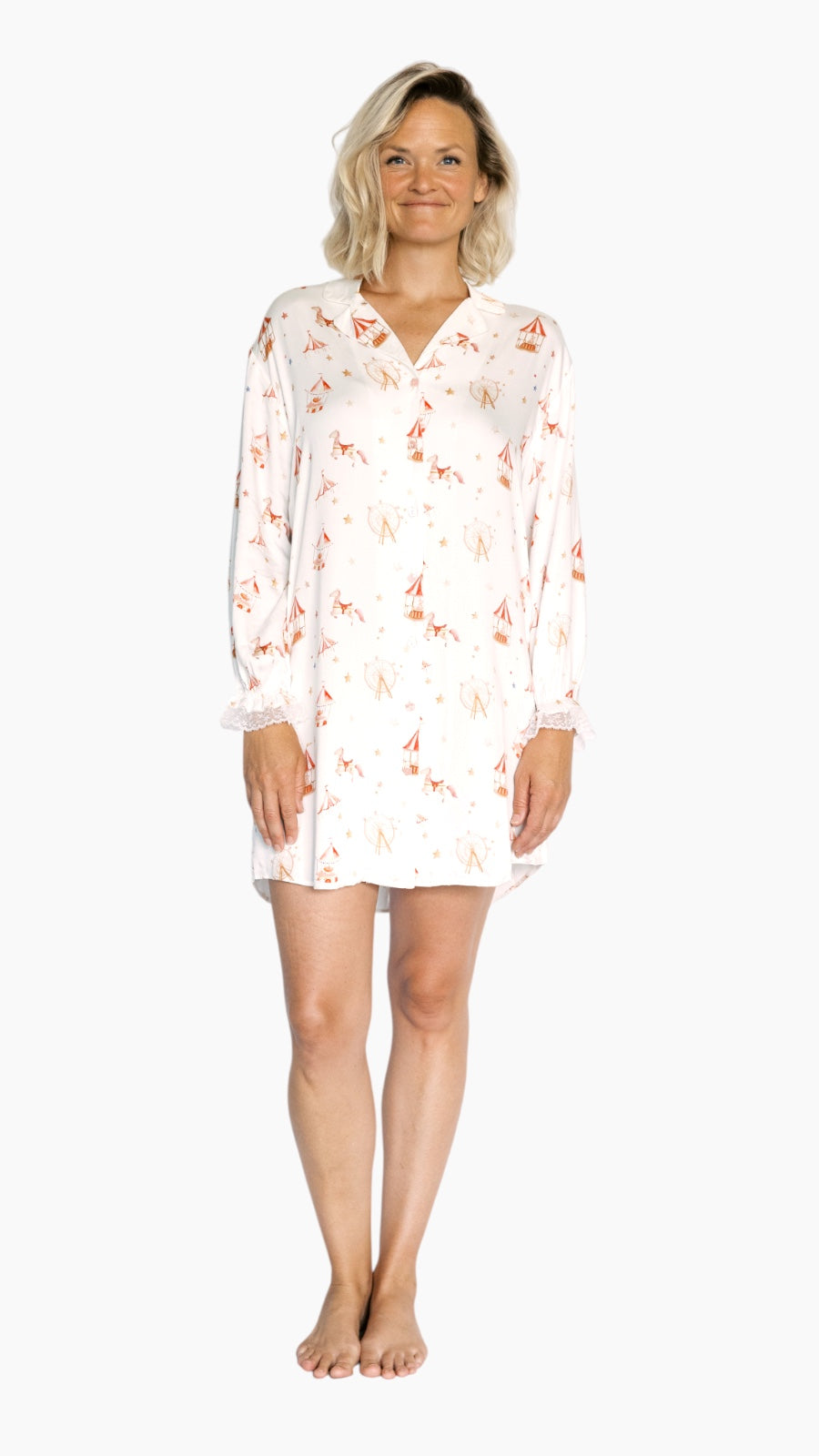 Woman wearing a white carnival print nightshirt on a white background